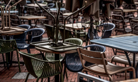 Empty restaurant tables due to shortage of skilled workers