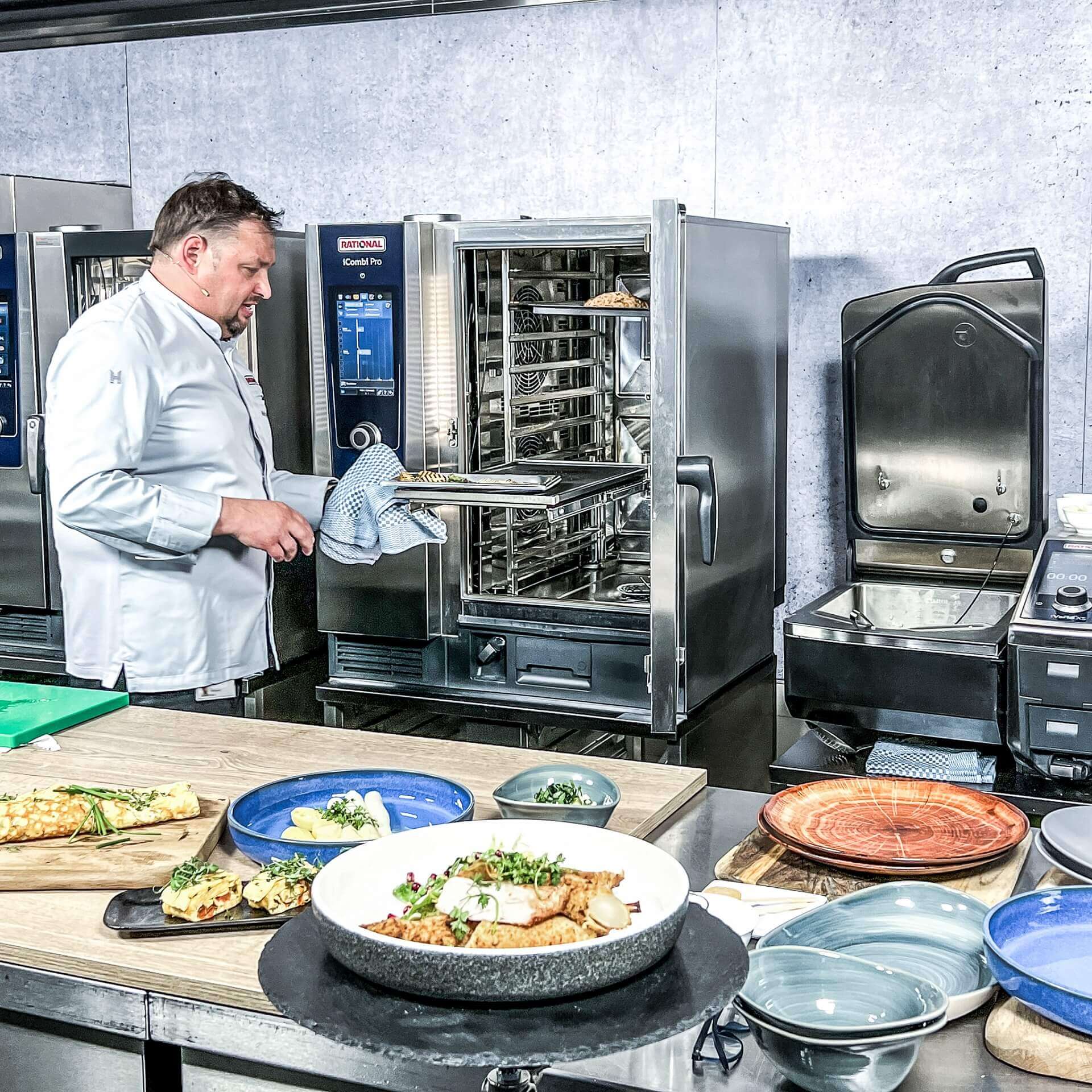 Chef unloads intelligent kitchen equipment - part of great hospitality management