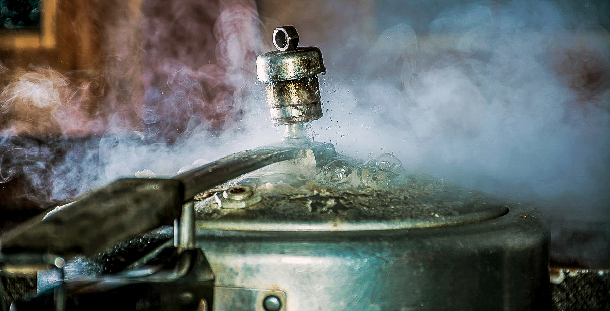 During pressure cooking, the boiling point of the water increases