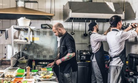 Professional young Chefs in a restaurant kitchen