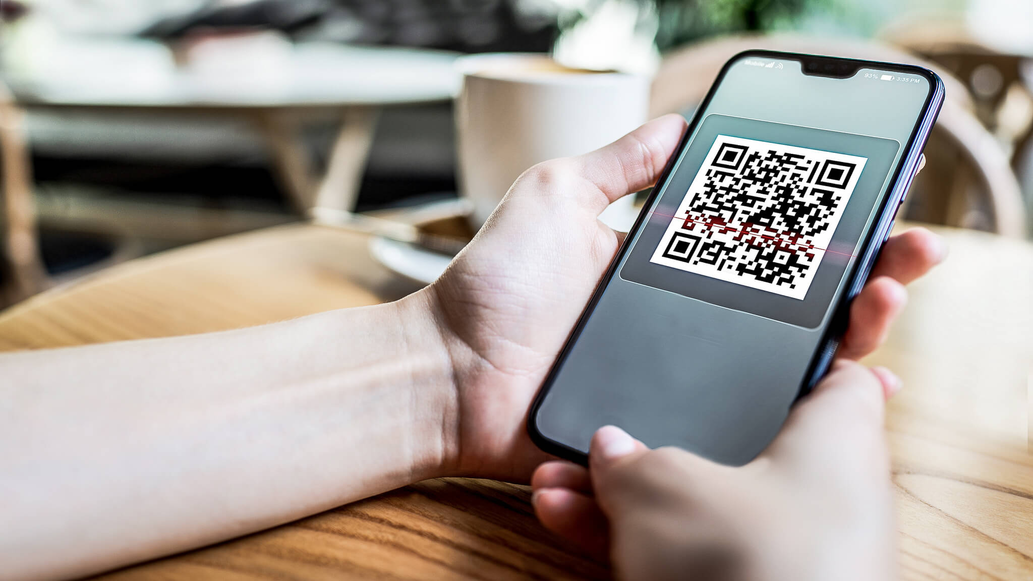 QR codes (important building block of IoT) is scanned in the restaurant.