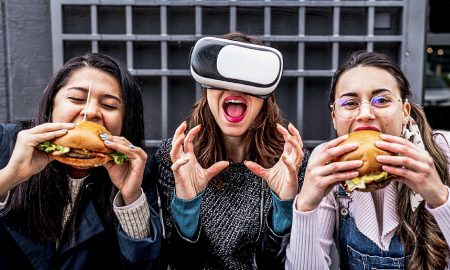 Group of young girls: Eating a real burger vs. a virtual one.